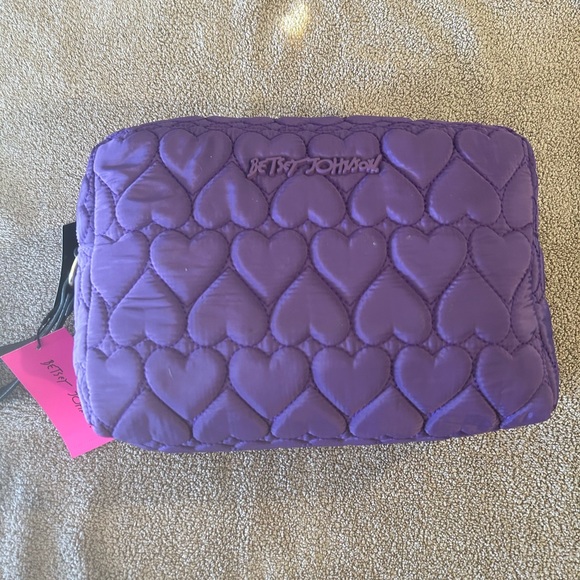 Betsey Johnson large purple cosmetic bag. New with tags.